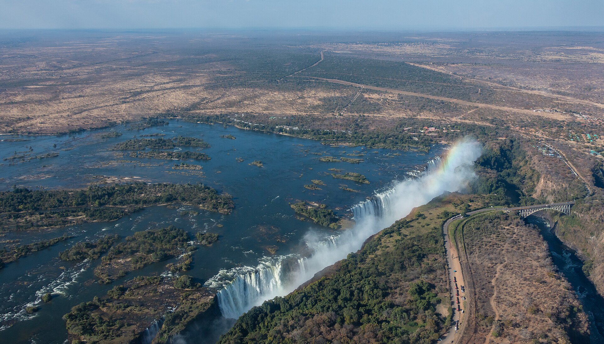 Victoria Falls on the Zambezi River, one of the largest waterfalls in the world, on Zambia's southern border. Credit: Diego Delso (CC BY-SA 4.0).